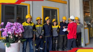 Factory Management Presenting Awards to Technical Employees